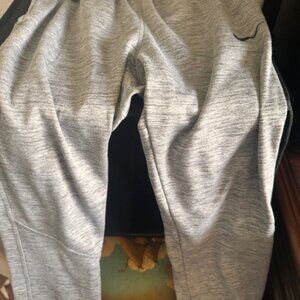 Kids Nike Sweatpants Gray Size Large-Nike emblem left front leg